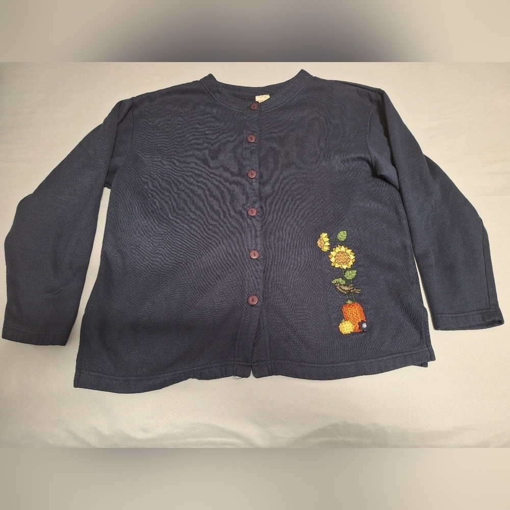 A Carreau embroidered fall scene cardigan sweater in a womens large.